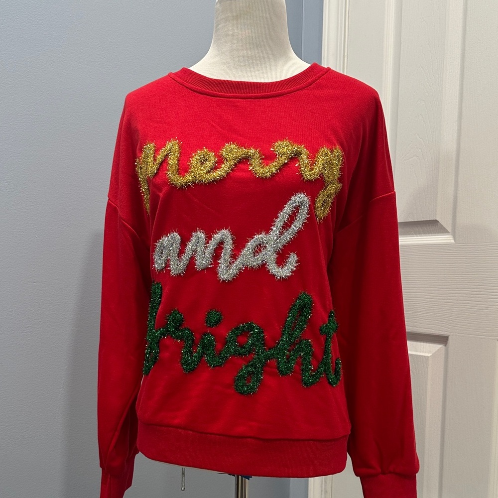 BiBi Christmas pullover with tinsel trim size small. NWOT